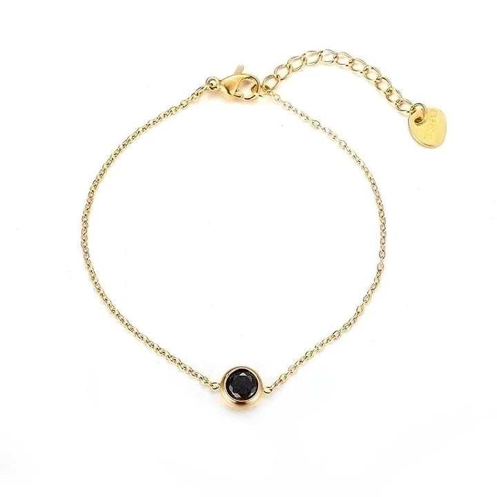 Goud armbandje met steentje zwart