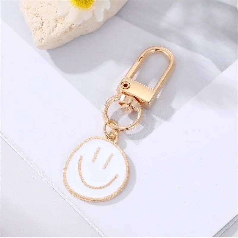 Smiley sleutelhanger wit