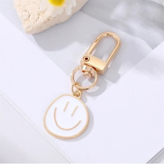 Smiley sleutelhanger wit
