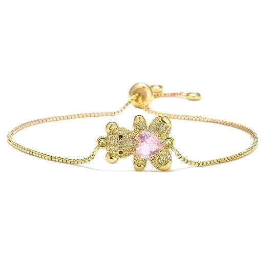 Gouden beertjes armband met gekleurd steentje rose