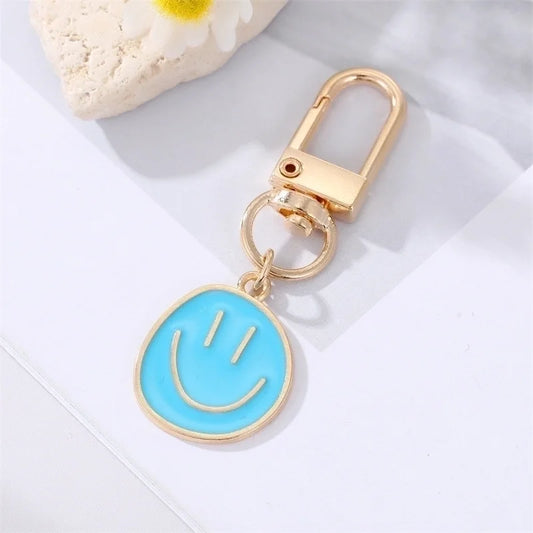 Smiley sleutelhanger blauw