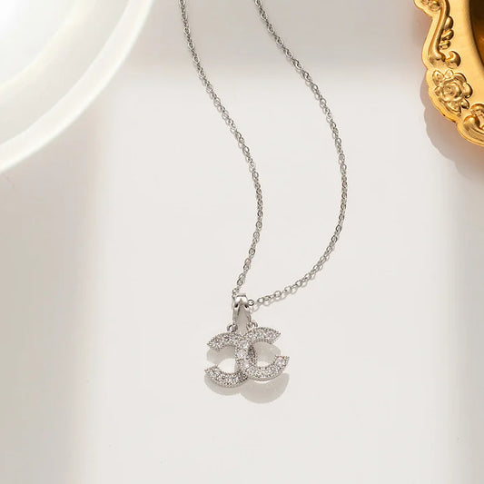 Zilveren ketting dubbel hangertje