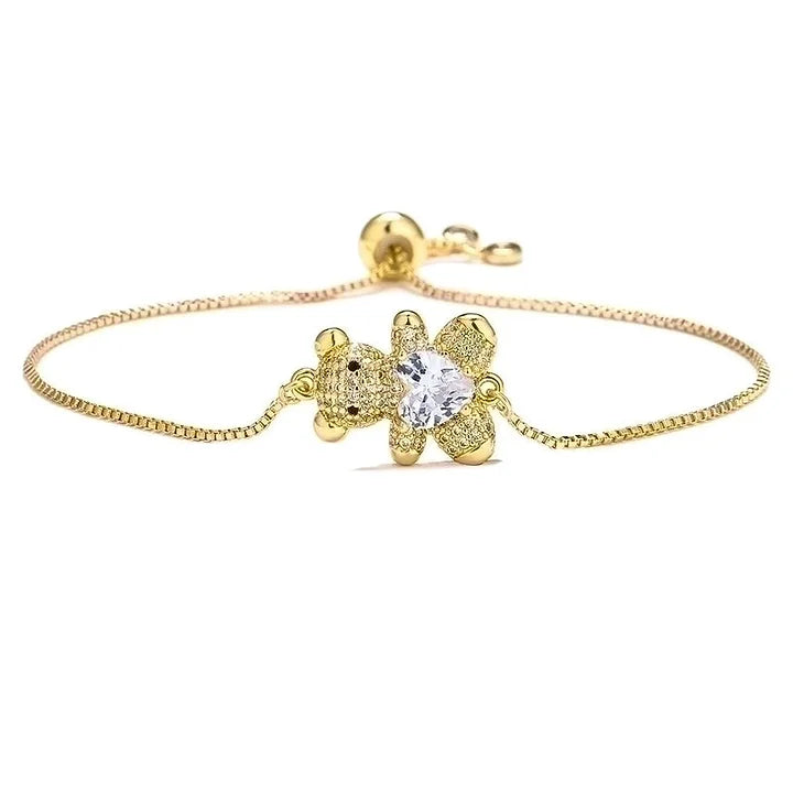 Gouden beertjes armband met gekleurd steentje wit