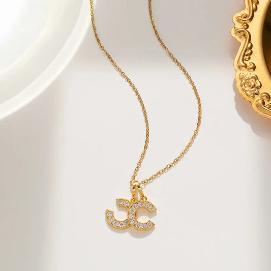 Gouden ketting dubbel hangertje